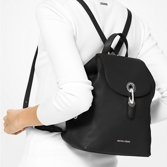 Michael Kors Raven Medium Pebbled Backpack
Black leather with silver hardware - Picture 4 of 13